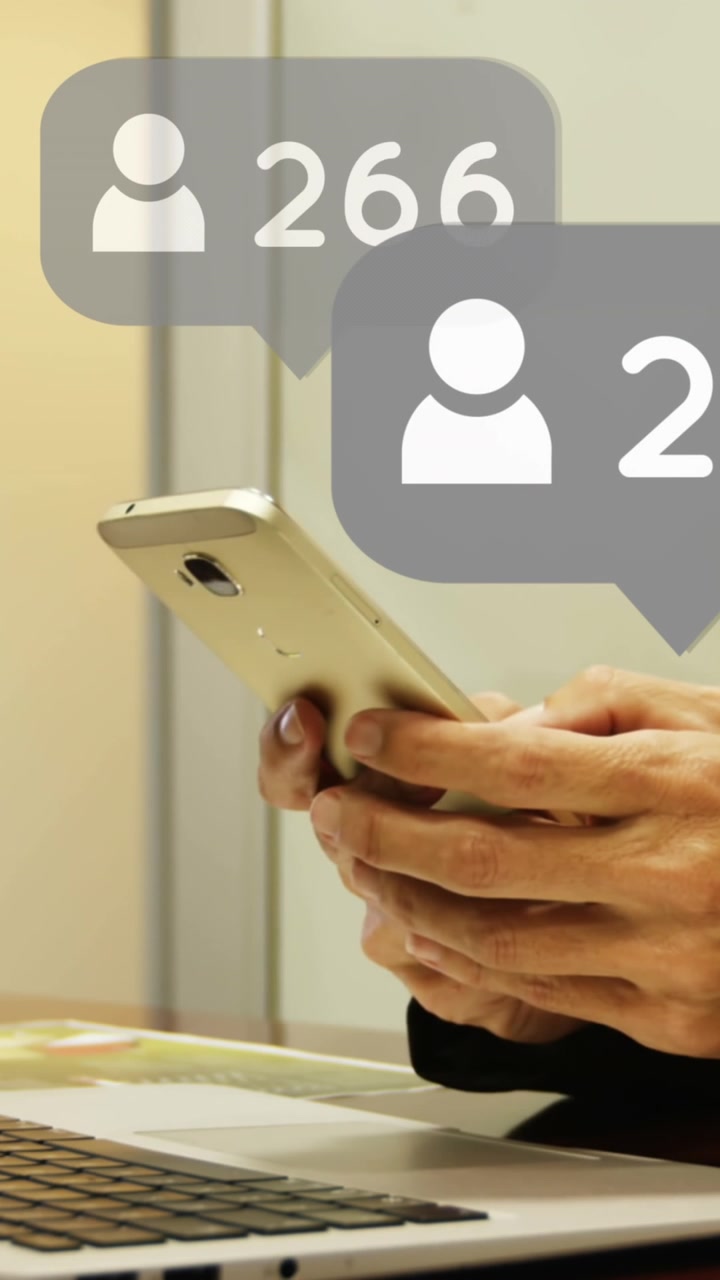 Animation of icons and numbers over woman using smartphone and laptop