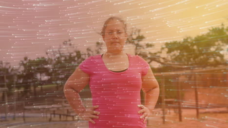 animation of person in pink shirt standing confidently with dynamic light streaks