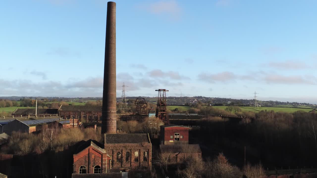 Abandoned run down Staffordshire historical industrial coal mine buildings aerial view