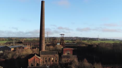 abandoned run down staffordshire historical industrial coal mine buildings aerial view