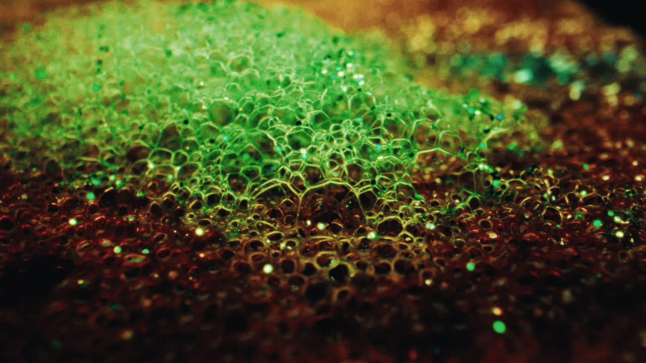 Abstract Macro of Green and Brown Bubbles with Glitter