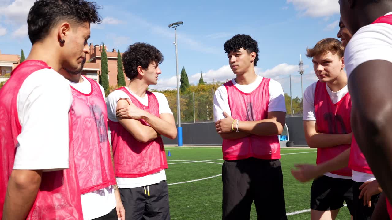 Soccer team huddle during training