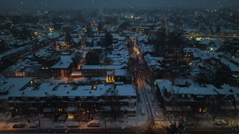 Snowy-winter-scene-in-american-housing-area-at-night