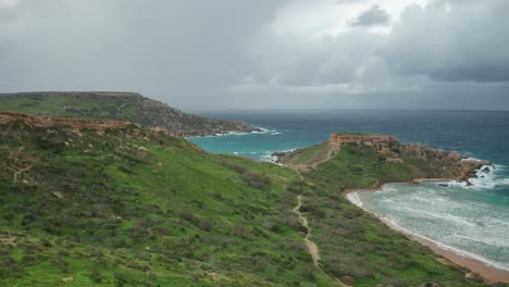 AERIAL:-Storm-is-Coming-to-Ghajn-Tuffieha-and-Il-Qarraba-Rock-Bay