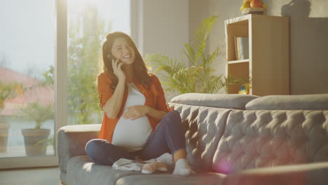 pregnant woman on the phone at home