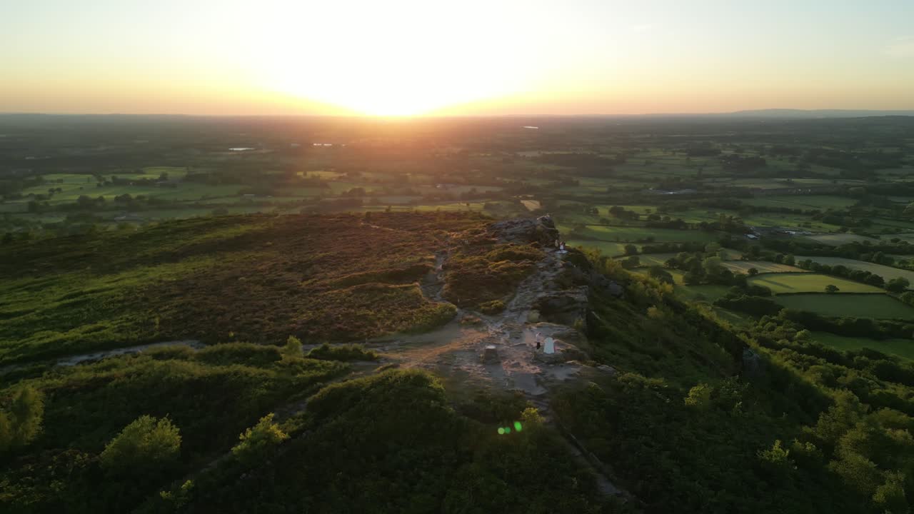 The stunning spiritual Cloud at Bosley on a full moon weekend in golden hour , Staffordshire UK - drone anti-clockwise rotate and move out