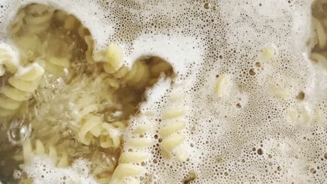 close up of boiling pasta being cooked