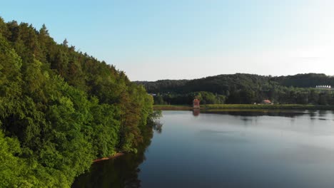 łapino lake in pomeranian district dolly shot from a drone