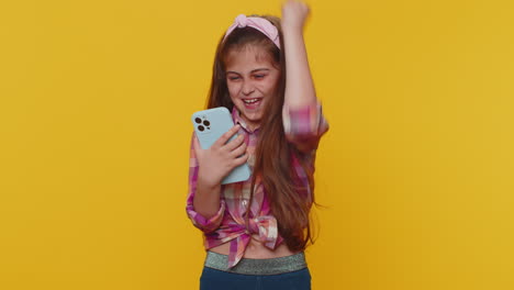 Child-girl-kid-use-mobile-smartphone-browsing-say-Wow-yes-found-out-great-win-good-news-celebrate