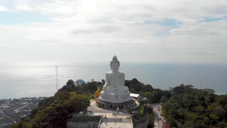 Zoom-in-and-fly-past-Big-Buddha-Statue-in-Phuket,-Thailand