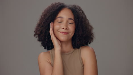beautiful young woman with curly hair smiling