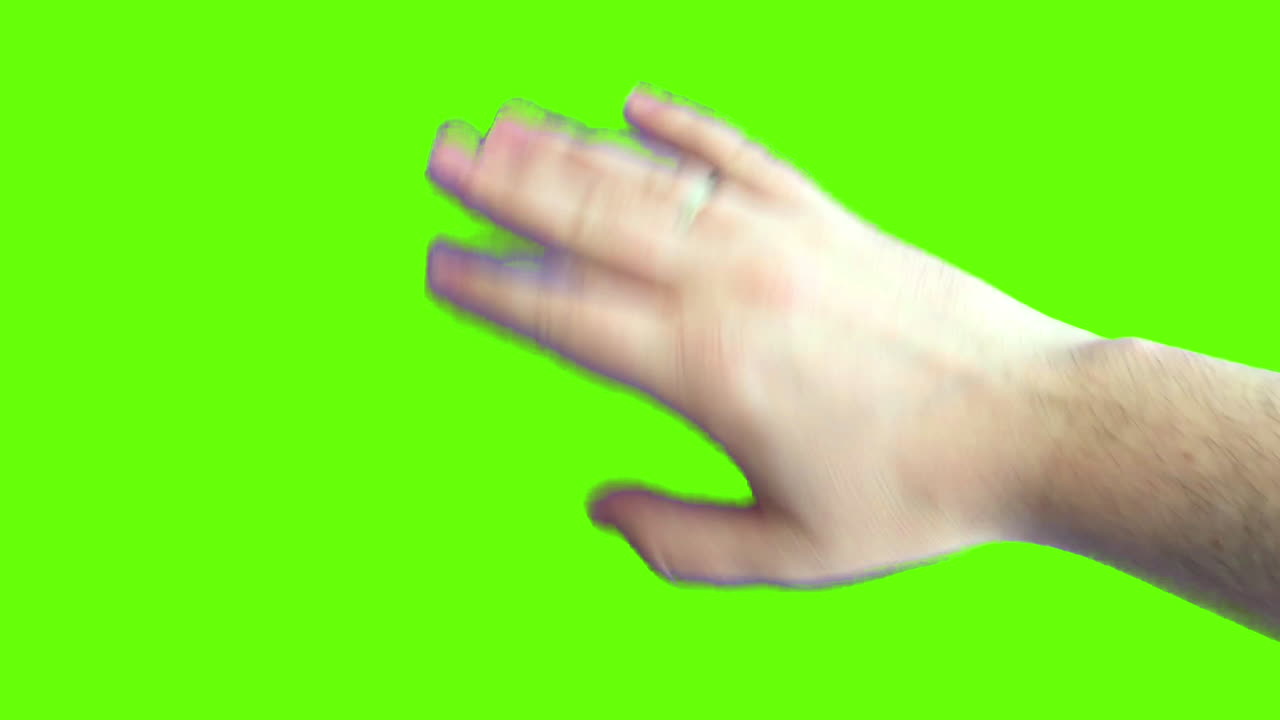 Motion Blurred Hand with Ring on Green Screen