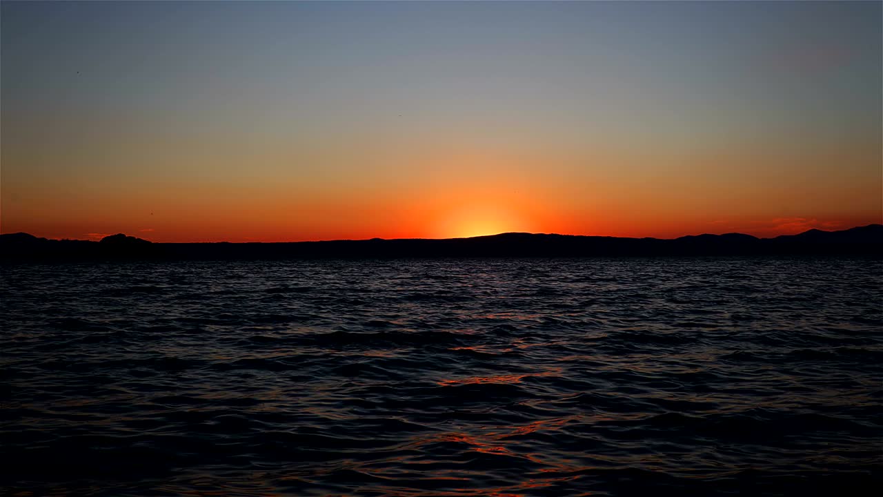 el atardecer, el lago de bolsena, italia