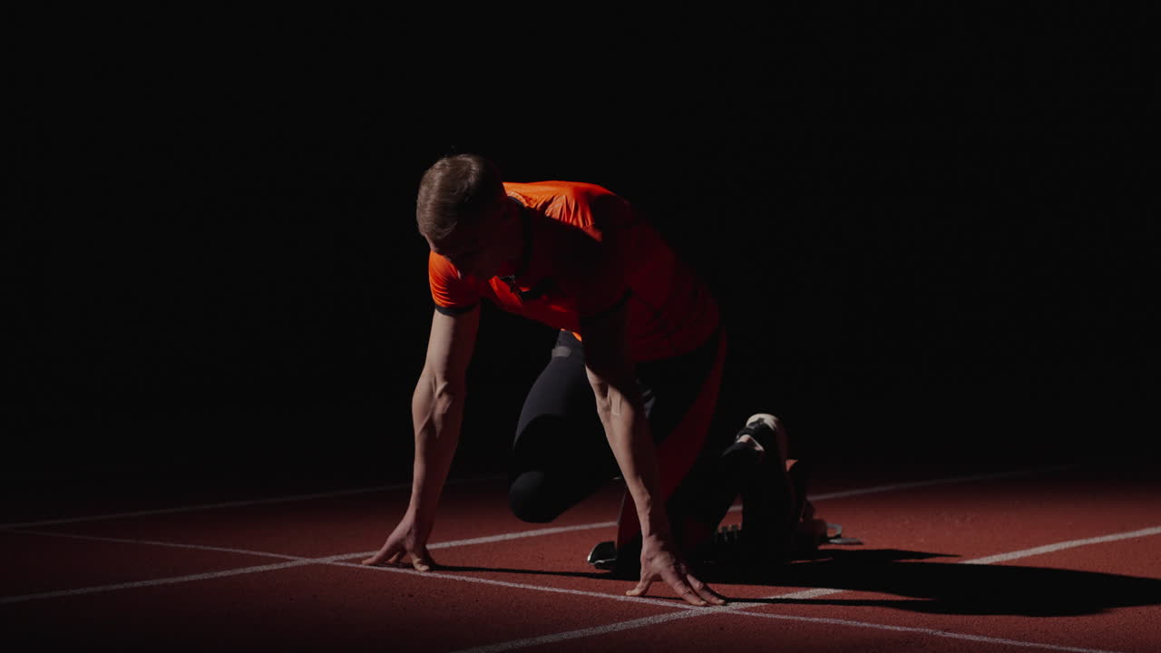 velocista en posición de salida
