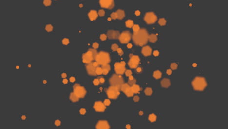 Vibrant-orange-dots-illuminate-a-dark-background,-creating-a-captivating-pattern