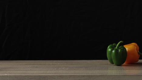 movement of fruits and vegetables rolling from left to right on the table