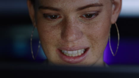 close-up-portrait-beautiful-woman-using-tablet-computer-smiling-enjoying-browsing-internet-looking-at-screen-working-late