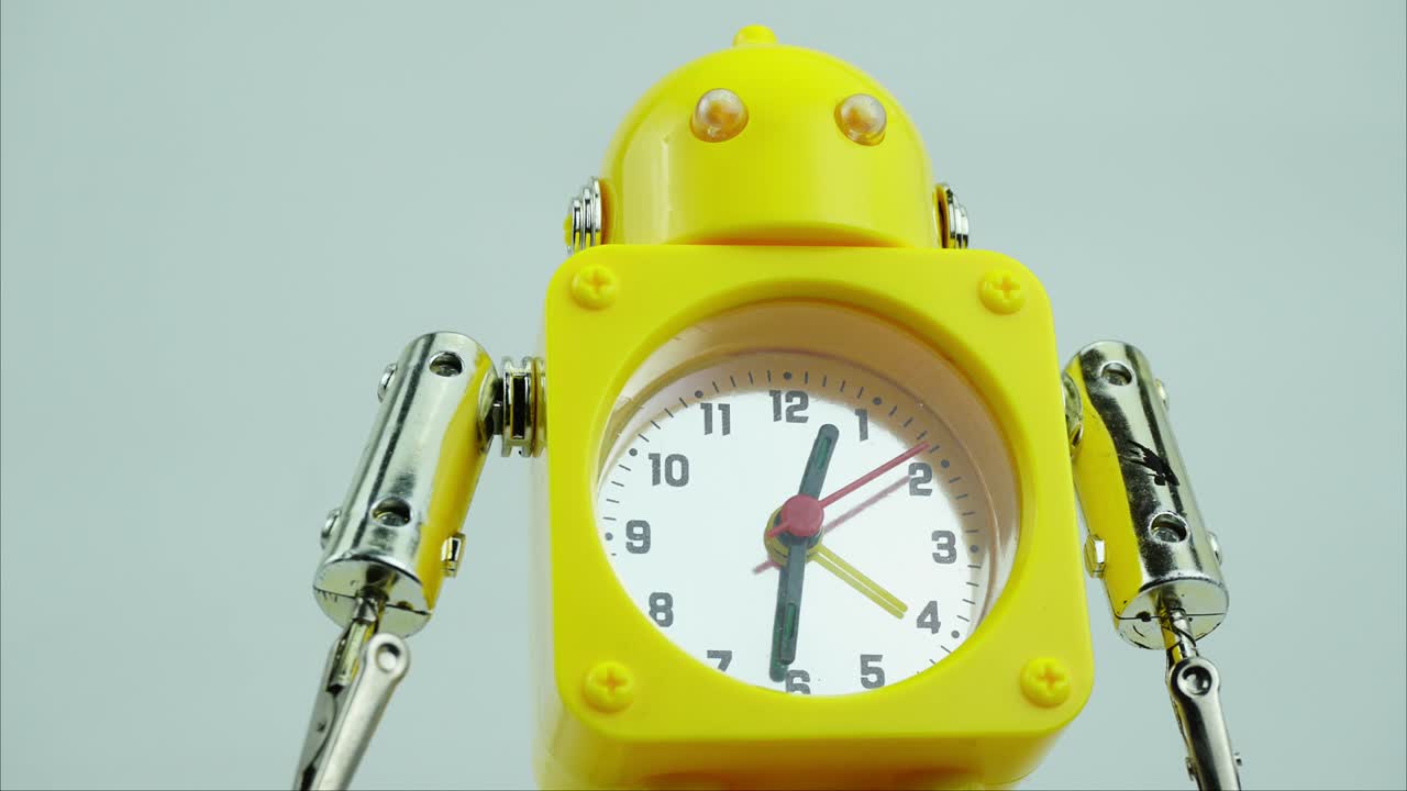 Time lapse, The yellow robot clock is showing the running of time.