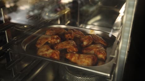 chicken wings baking in oven