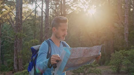 male traveler reading map