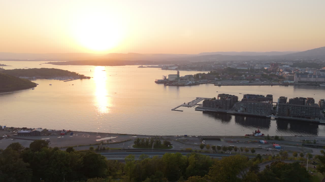 Oslofjord and Port of Oslo as seen from above Ekebergparken, sunset aerial view