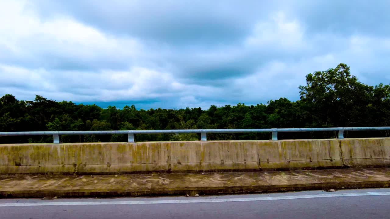 Beautiful View Drive Along Sempadi Lundu Coastal Road with Green Forest and Mountain,Sarawak,Borneo.