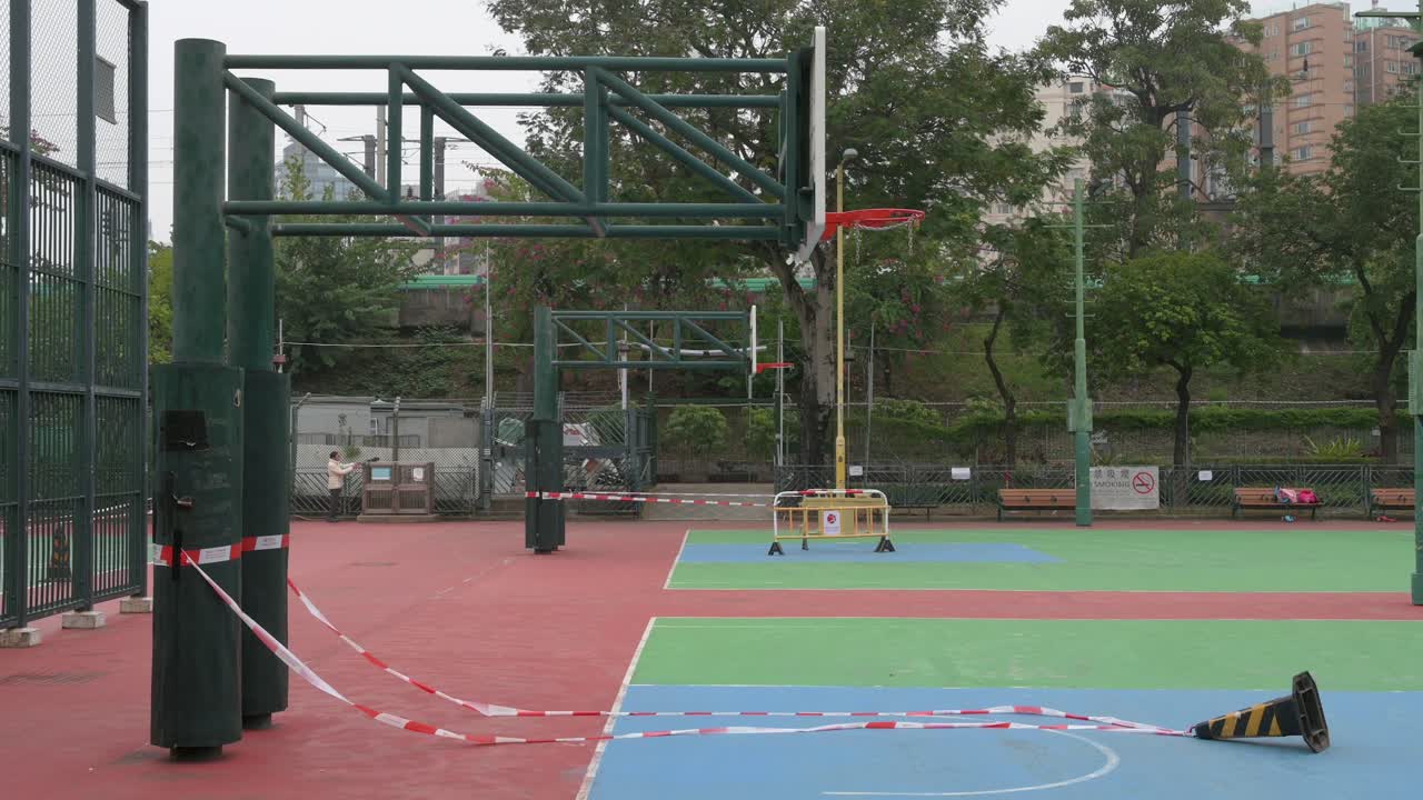 Empty colorful basketball courts are seen at a closed playground due to Covid-19 Coronavirus outbreak and restrictions in Hong Kong