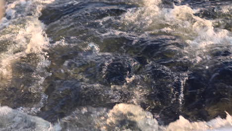 Fishing-Pole-out-of-focus-with-Ocean-Water-Moving-from-boat-motor