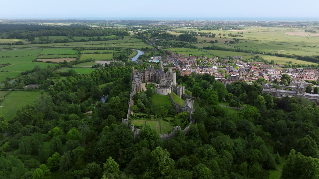 Arundel Castle And Town With Rural Fields In West Sussex, England, UK. - aerial shot