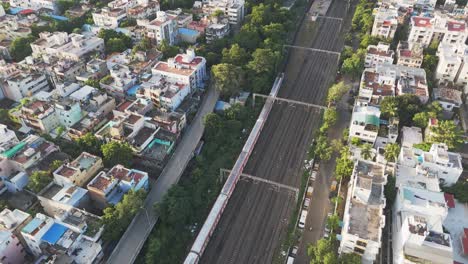 aerial view of a train station in a densely populated city