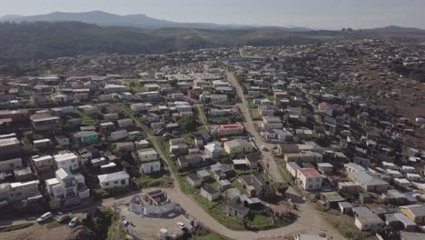 aerial flight: emzini township on hilltop above knysna, south africa