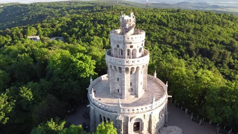 people walking on the stairs of this beautiful tower in budapest, hungary