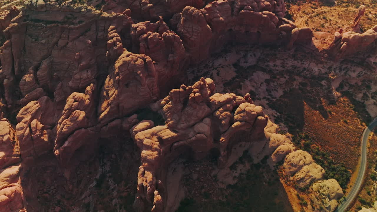 Amazing weird-shaped tops of canyons. Impressive rocks of Arches National park in Utah, USA on sunny daytime.