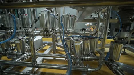 modern craft brewery. craft beer production. modern equipment in brewery, metal tanks, alcoholic drink production