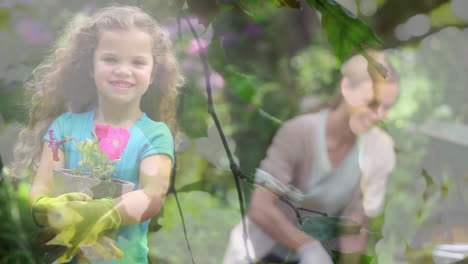 video de luces azules sobre una niña caucásica sonriente y una mujer trabajando en el jardín