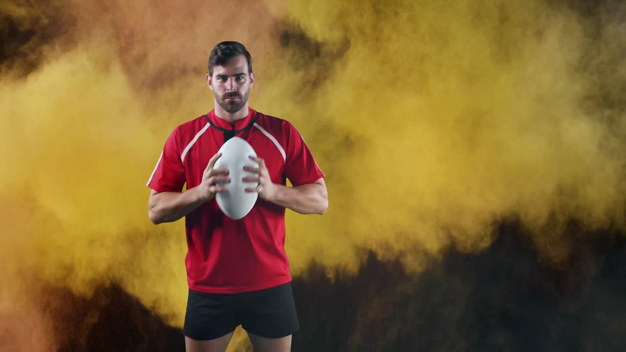 jugador de rugby profesional sosteniendo una pelota 4k