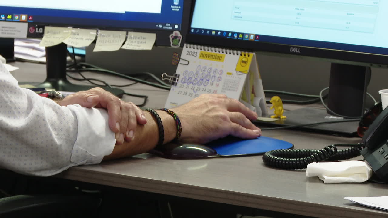 Person Working at a Desk in an Office