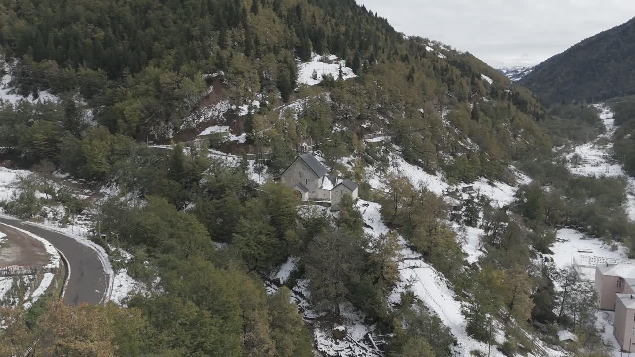 Cinematic daytime drone footage of a church in Ajaria, Georgia.