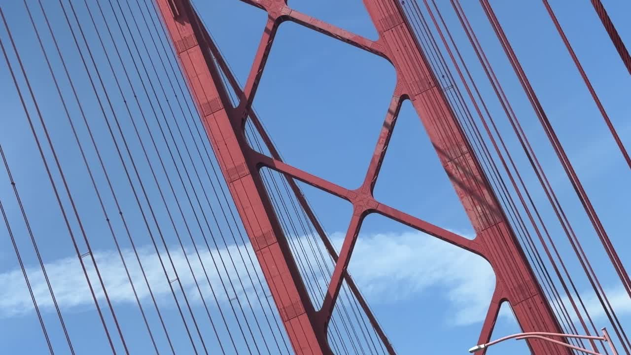 Low Angle View of Red Suspension Bridge Structure and Cables