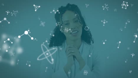 animation of molecules over biracial female lab worker