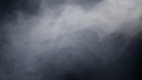 haze smoke swirling on black background 18