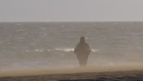 fishing on a windy beach