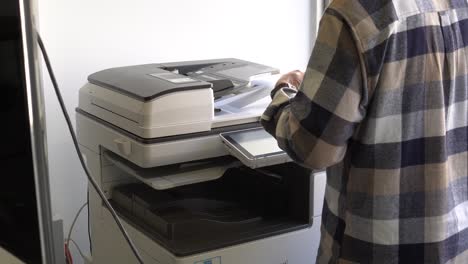 closeup of business men use copiers at the office