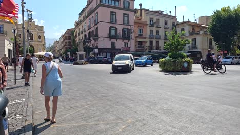 pedestrians and vehicles in a busy intersection