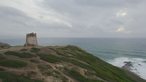 Aerial-view-traveling-in-the-Flumentorgiu-tower-on-the-island-of-Sardinia-and-in-a-beautiful-environment