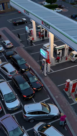 gas station experiencing fuel shortage with 'no fuel' sign