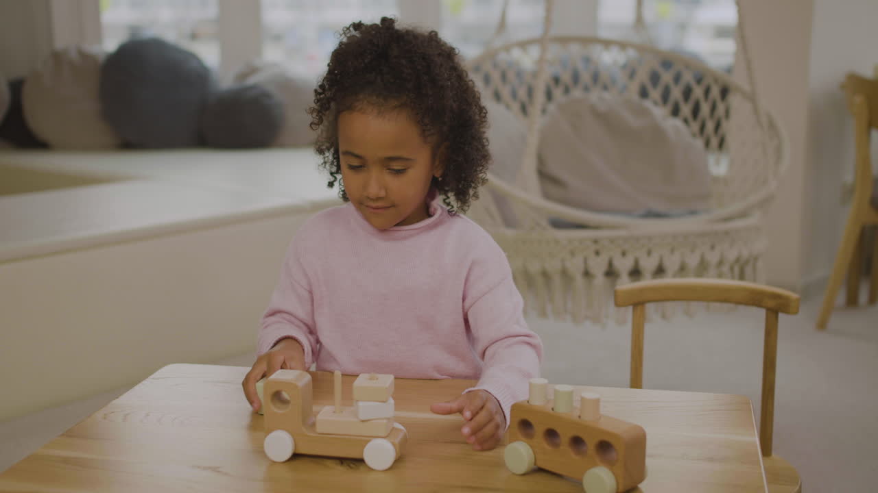 Little girl in the playroom