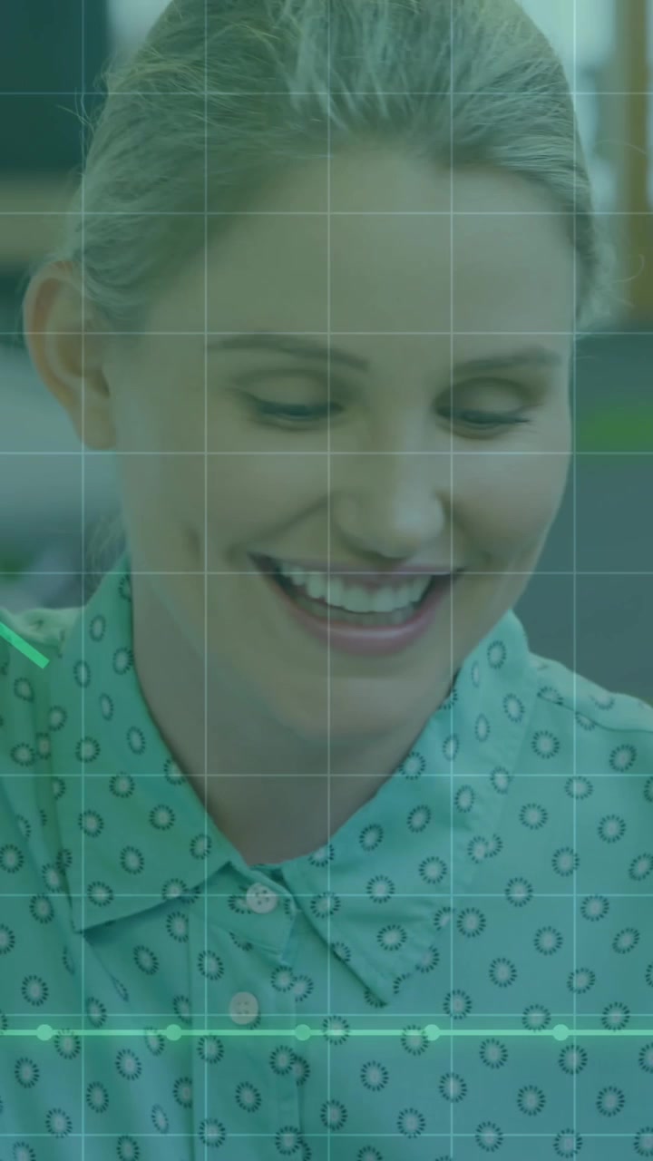 Animation of statistical data processing over caucasian woman talking to her colleagues at office