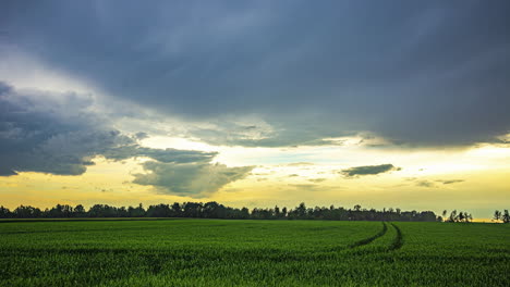 Stormy-clouds-flowing-away-revealing-sunny-sky,-time-lapse-view