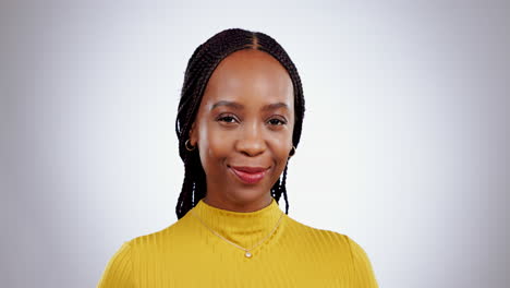 Face,-woman-and-wink-in-studio-with-smile